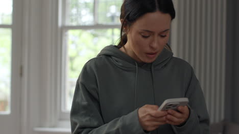 Stressed And Worried Woman With Financial Worries About Cost Of Living Crisis Debt And Paying Bills At Home Looking At Mobile Phone 1