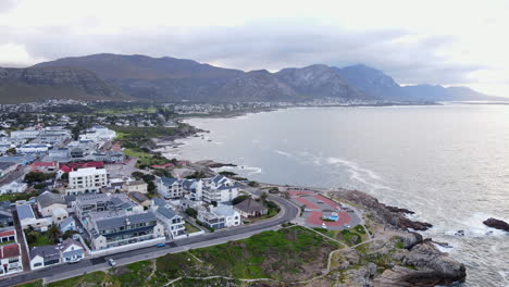 aerial reveals rugged beauty of hermanus coastline overlooking scenic bay