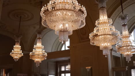 ornate crystal chandeliers in a grand hall