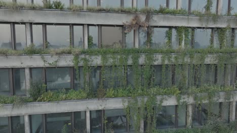 Aerial-Drone-Shot-Krakow-Poland-Abandoned-Soviet-Brutalist-Structure-Hala-Forum-at-Sunrise