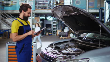 mechanic doing car yearly checkup