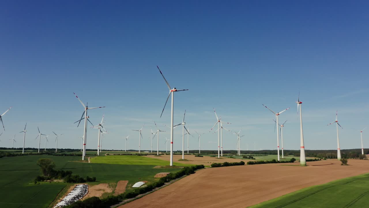 Wind Farm Over Rural Landscape