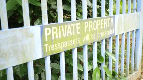 private property no trespassing text and buildings ,