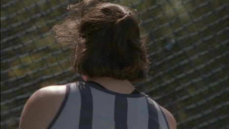 a women hammer thrower competing in an sporting event