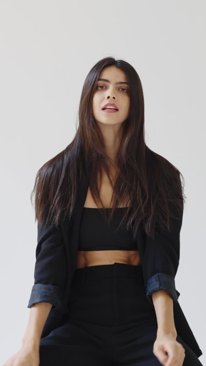 Elegant woman in black suit