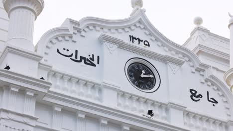 galle fort - meeran jumma masjid. sri lanka. clock on the mosque close-up. snow-white beautiful mosque building in galle fort. slow motion 120 fps video, prores 422, 10 bit