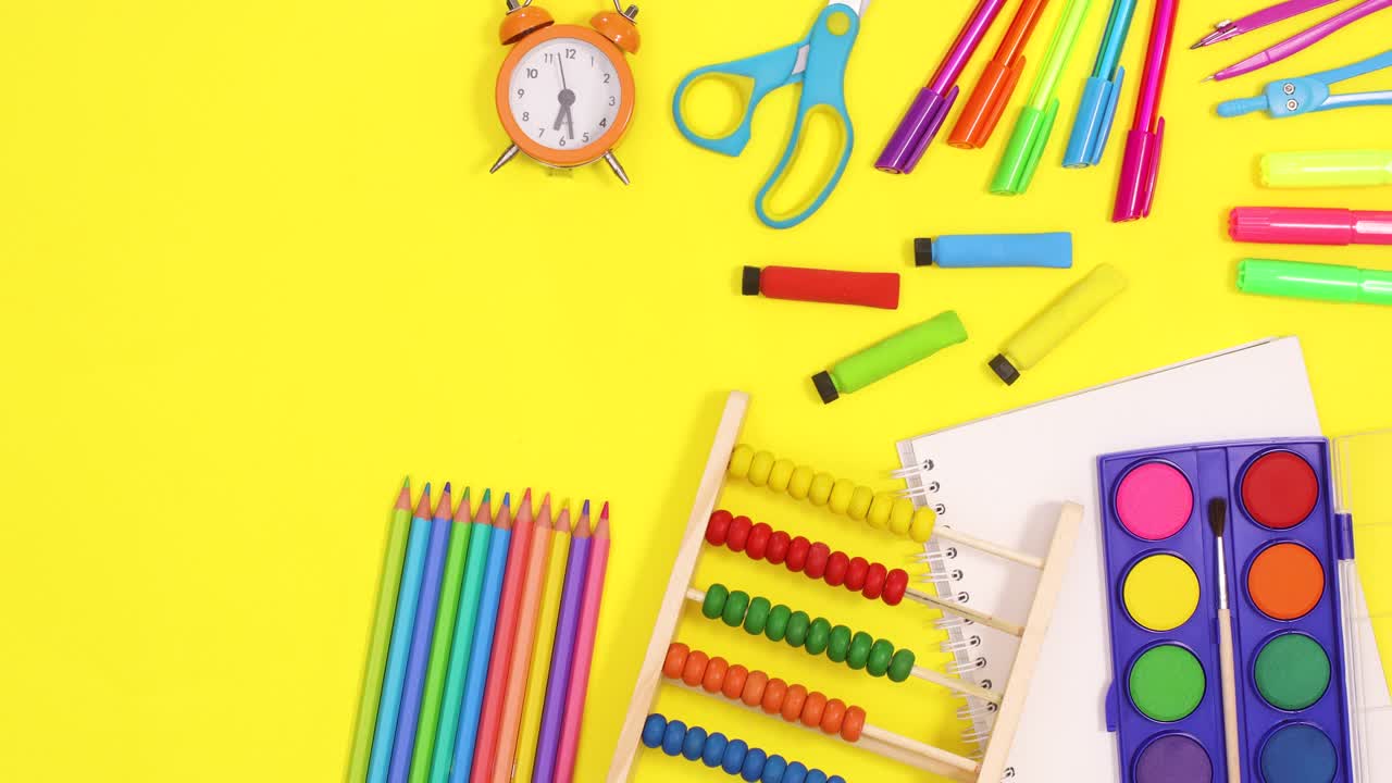 School tools appear on right side of yellow theme. Back to school stop motion