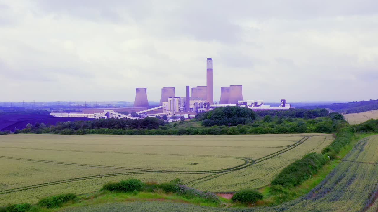 Low-level aerial of Power Station as a point of interest with a left to right panning