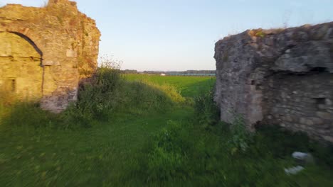 Drone-ran-out-view-to-the-Greenfields-at-the-Fortress-of-bashtove,-Albania