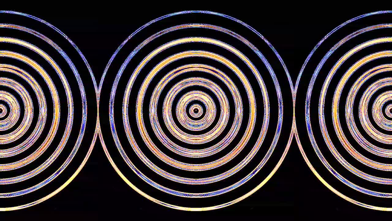 forma redonda animada de luces intermitentes multicolores, sobre un fondo negro