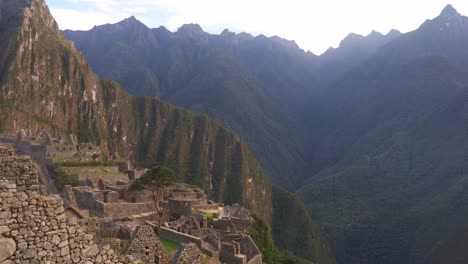 machu picchu famous ancient inca ruins, mountain landscape, tilt down