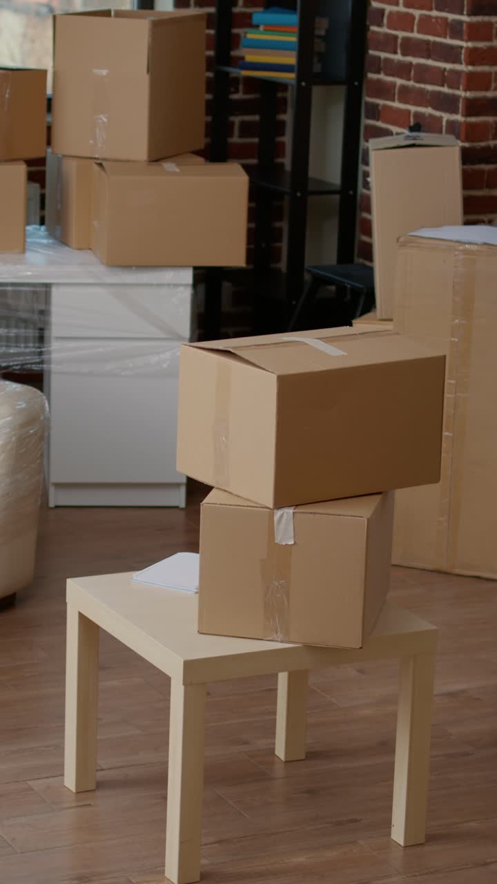 Moving boxes in an empty apartment