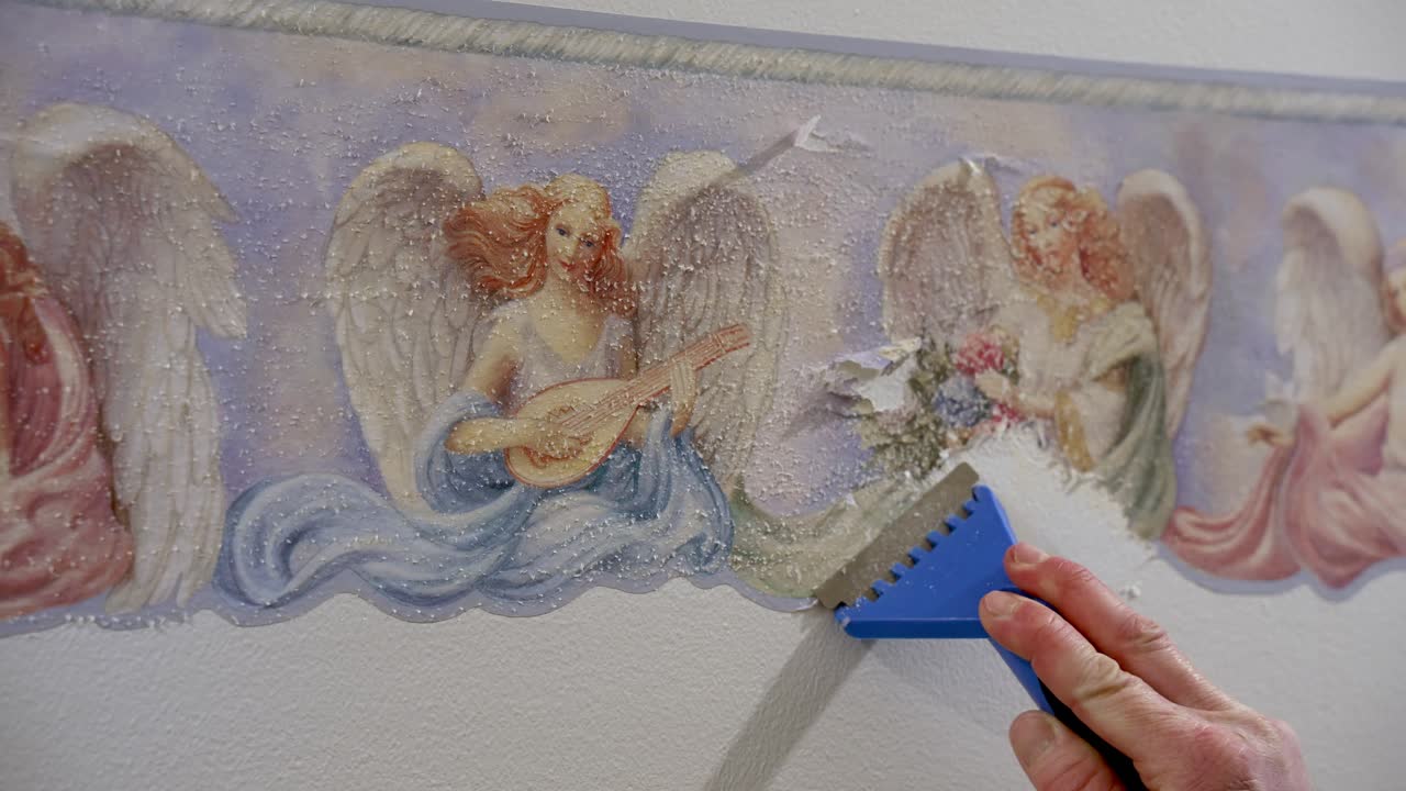 Renovate by scraping old wallpaper from the surface with handy tool