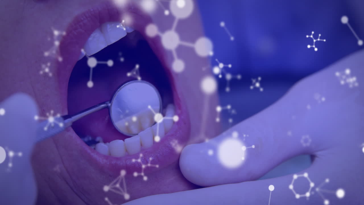 Dental examination with molecular structure animation over patient's open mouth