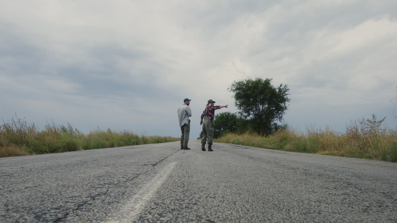Couple Walking Down a Country Road