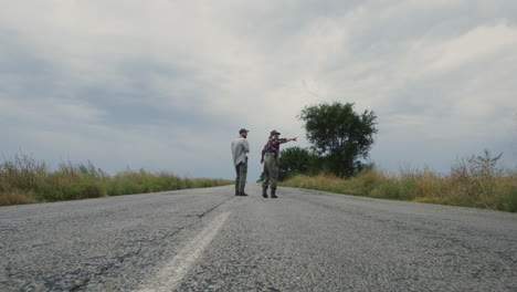 couple walking down a country road