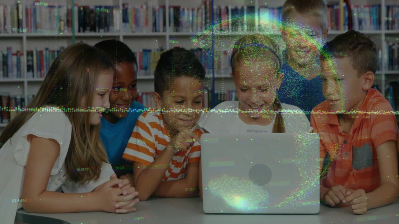 Vertical video: 7 kids crowding laptop in school library, pointing and using pad amid moving glare