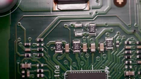 close up shot of computer motherboard with chip, cpu and microprocessor