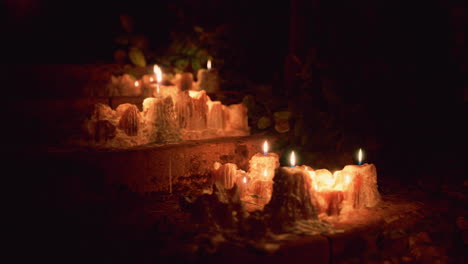 candles burning in the dark