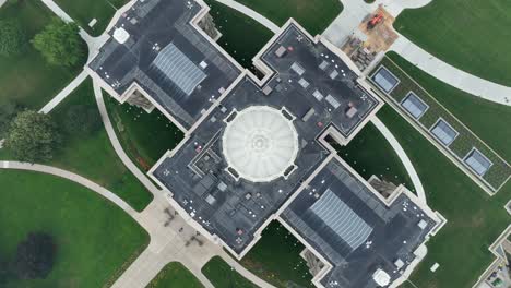 top down aerial shot of michigan state capitol building in lansing, mi