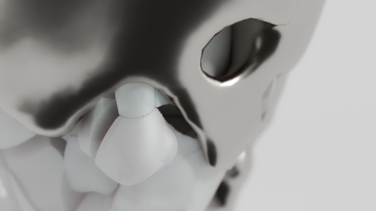 A silver liquid metal flows slowly on the sculpture