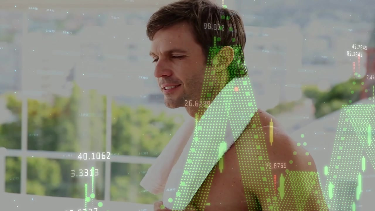Fit man lifting water bottle and initiating hydration, while finance graphs overlaying towel