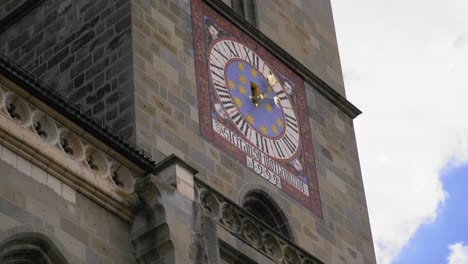 the clock tower of the medieval gothic old church called the black church in brasov, romania