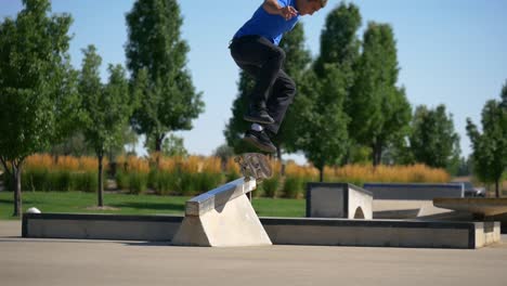 kickflip back smith on a down rail on a skateboard