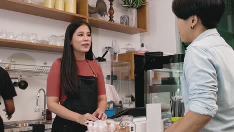 customers order drinks at the counter and pay via mobile banking.