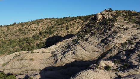 Aerial-drone-view-of-the-cliff-mountains-in-the-sunny-morning