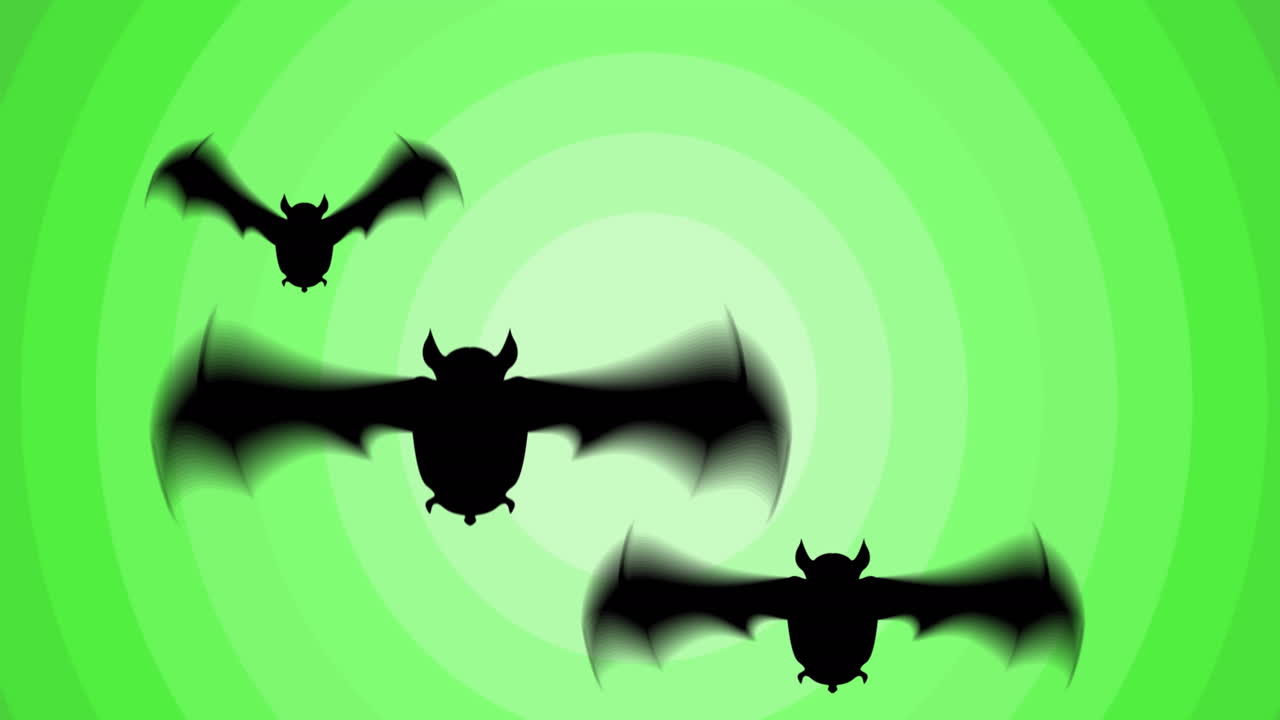 Animazione di tre pipistrelli neri che volano su anelli verdi concentrici