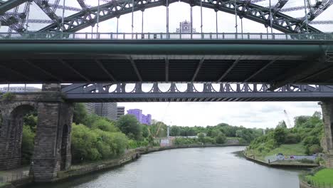 Aerial-flying-under-Wearmouth-Bridge-on-River-Wear