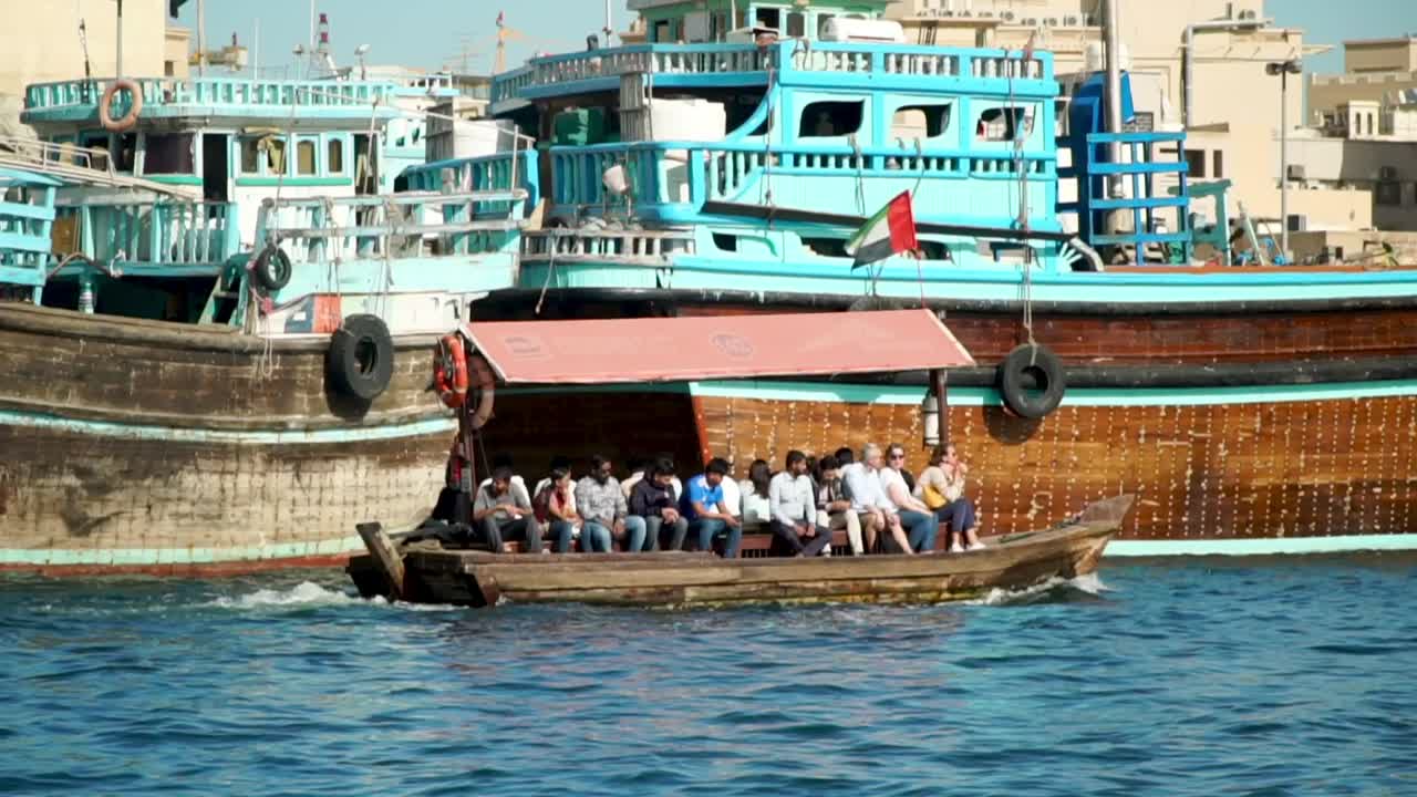 Abras negotiate the waters of the Dubai Creek in the Old Town Dubai in this Middle Eastern city.