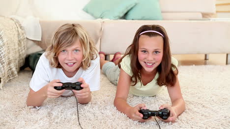 brother and sister playing video games