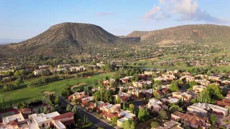 aerial scenic view, bright sunny day, landscape of butte over townhouses, sedona arizona