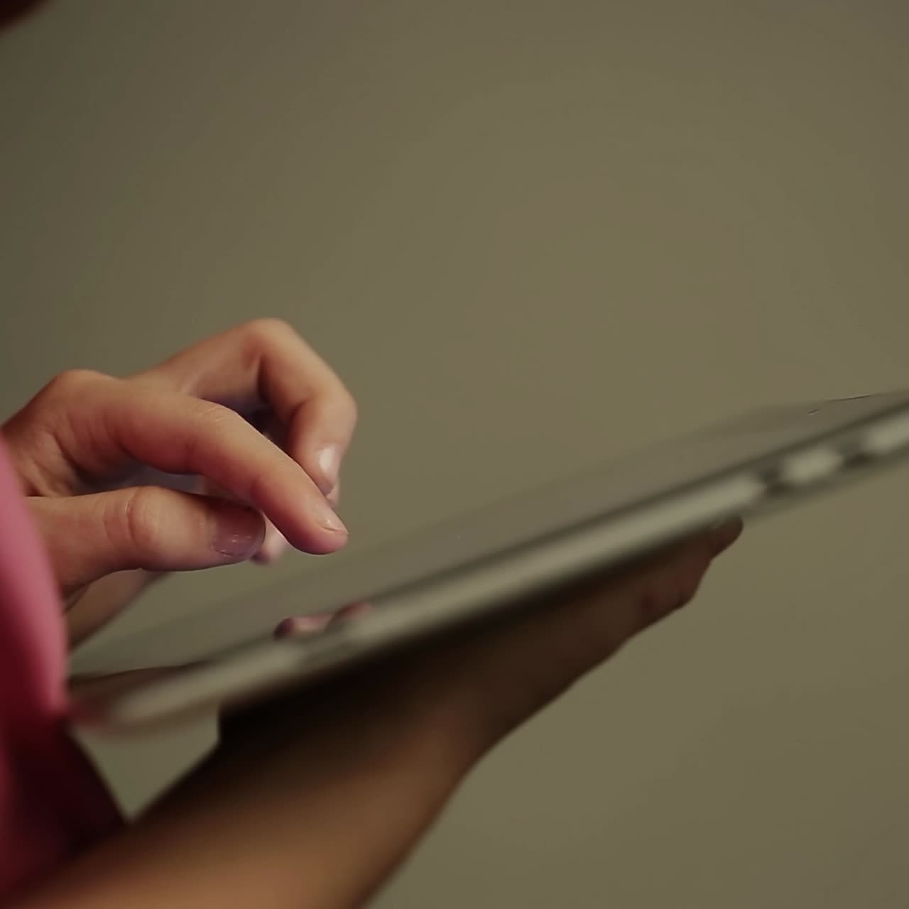 Girl with a tablet in the hands.