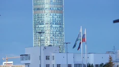 tall building with flags