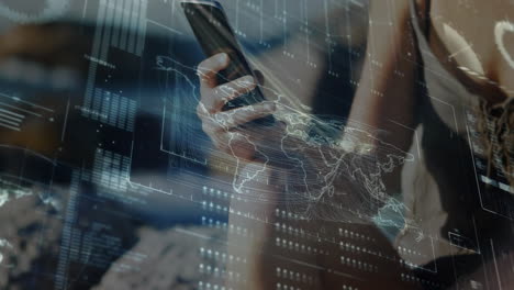 person holding smartphone with digital world map and data overlay animation