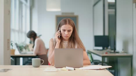 business woman working at computer. angry person working with documents.