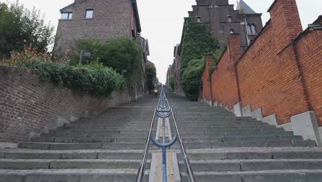 montagne de bueren stairs, liege, belgium, a long historic staircase framed by walls