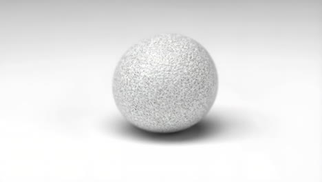 textured speckled egg on white background