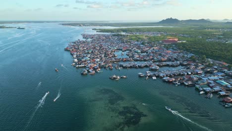 sunset aerial of semporna, nestled on the enchanting island of borneo within the malaysian state of sabah