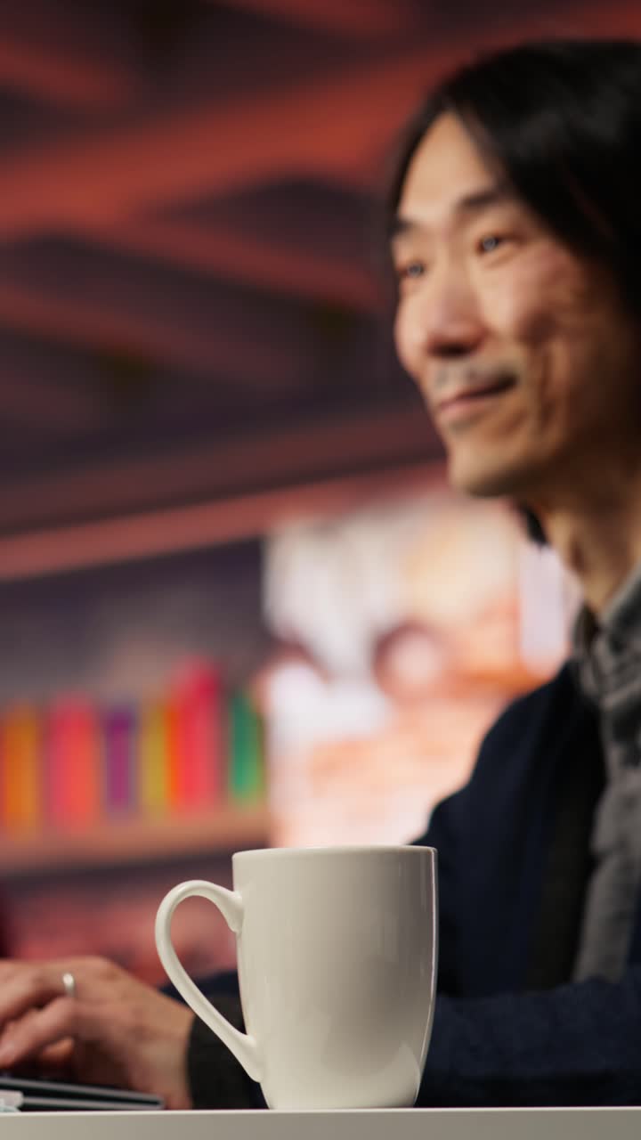 Vertical video Senior admin working in innovative startup office, close up