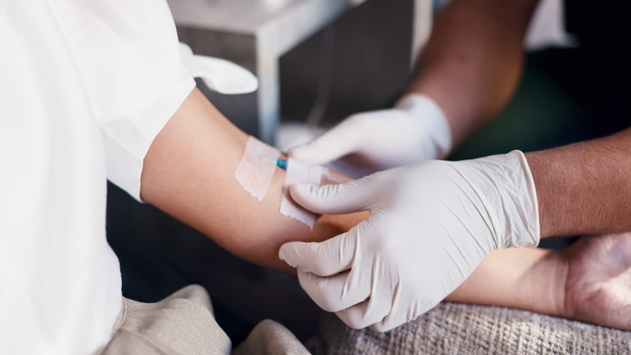 Close-up of Patient Receiving IV Drip in Arm