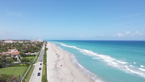 Gorgeous-coastal-turquoise-water-beach-of-West-Palm-Beach,-Florida-by-drone