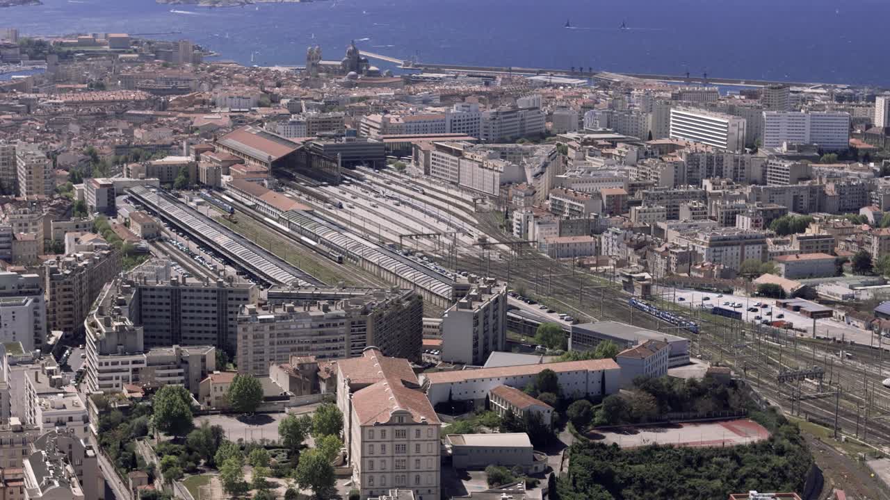 Drone view, train approaching Marseille-St-Charles train station in Marseille, France
