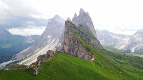 seceda’s jagged peaks tower above green alpine meadows, stunning dolomite range