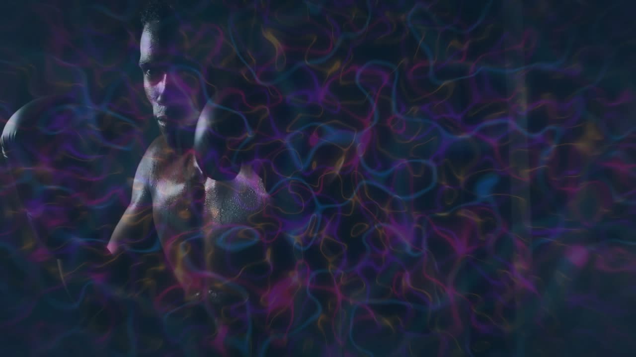 Male boxer on cue rotating torso turning head gloved animated ribbons revealing muscles for boxing