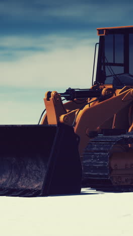 orange bulldozer on construction site