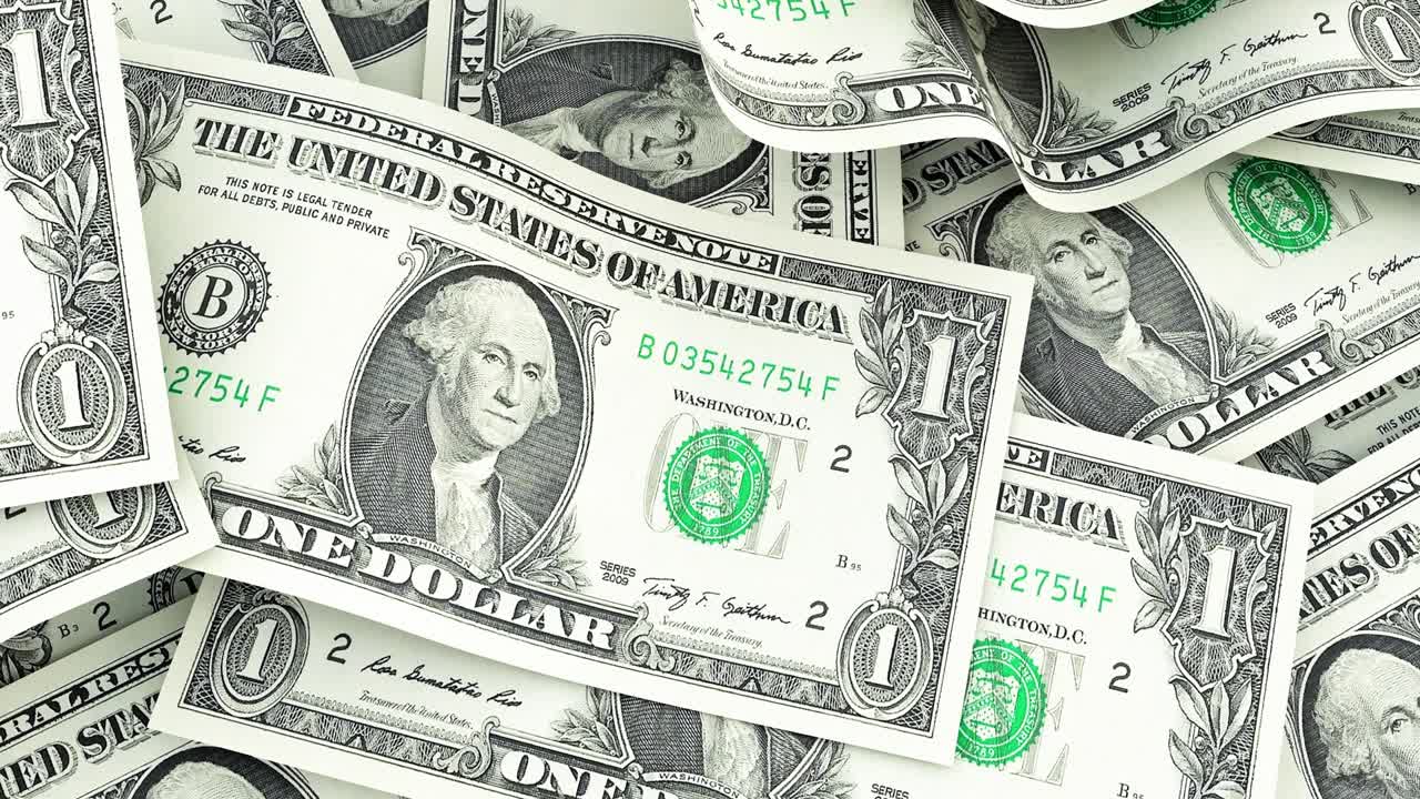 muchos billetes macro de un dólar estadounidense. concepto de finanzas e inversiones. pila de dólares estadounidenses dinero en efectivo,